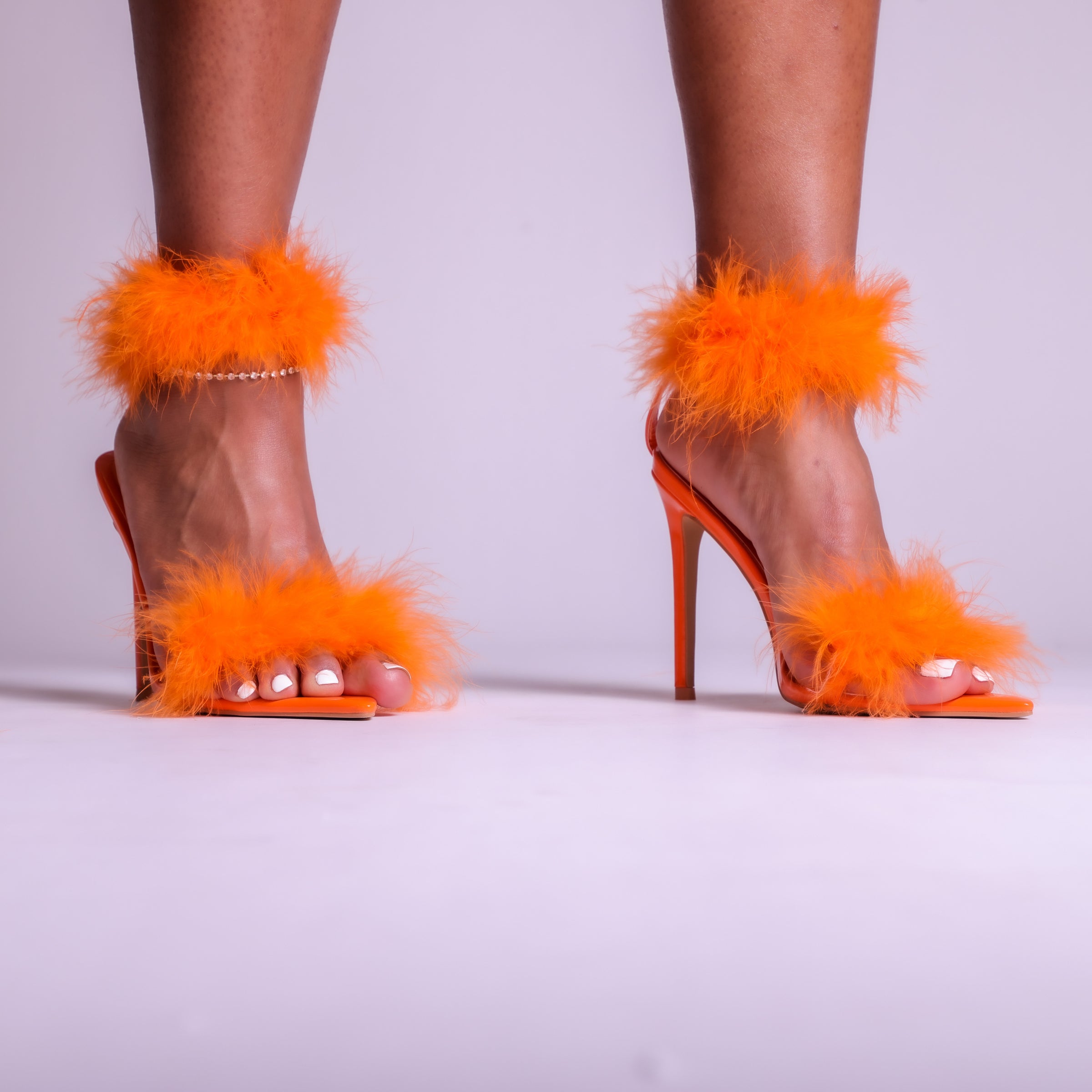 Buy HIGH POINTY-TOE ORANGE PUMPS for Women Online in India